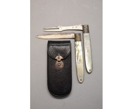 A rare Georgian leather cased silver and mother-of-pearl folding knife and fork set, 7.8cm long when folded, the case labelle