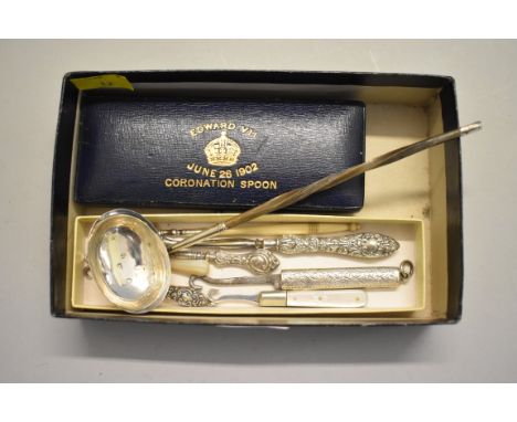 A cased Edward VII 1902 coronation silver spoon;&nbsp;together with a small silver and baleen sauce ladle; folding buttonhook