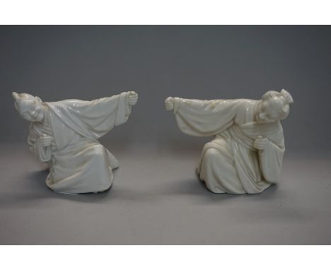 A rare pair of Victorian Royal Worcester blanc de chine 'Chinaman' menu holders, circa 1880, 10.5cm high. 