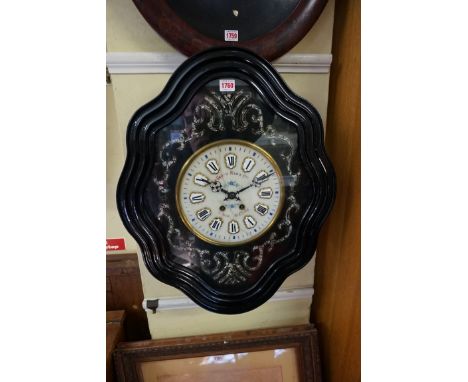 A 19th century French ebonized vineyard clock, the painted marble dial with enamel chapter ring, 62 x 50.5cm, with pendulum. 