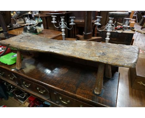 An antique rustic hewn elm bench,&nbsp;138cm wide.&nbsp; 