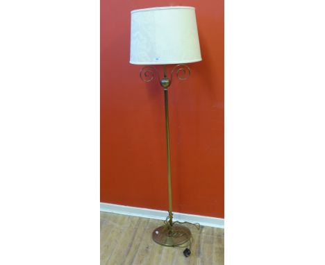 A brass standard lamp complete with shade, 159cm high