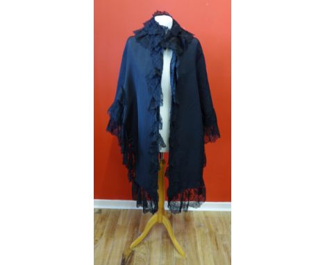 A Victorian black lace edged mourning cloak 