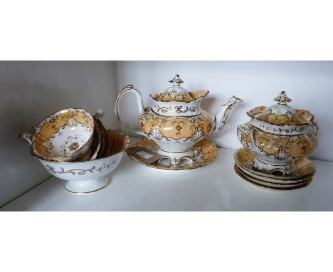 19th century Staffordshire Rockingham type cream and gilt glazed teawares to include four cups, four saucers, cake plate, slo