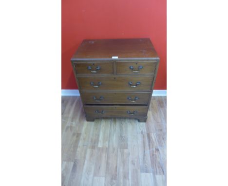 A 19thc century mahogany chest of drawers having two short over three long graduating drawers raised on bracket feet, 61 x 73