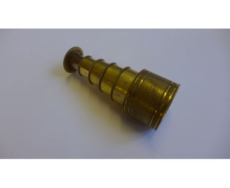 Banks, 441 Strand miniature five draw brass telescope with engine turned decoration (9cm long when extended)