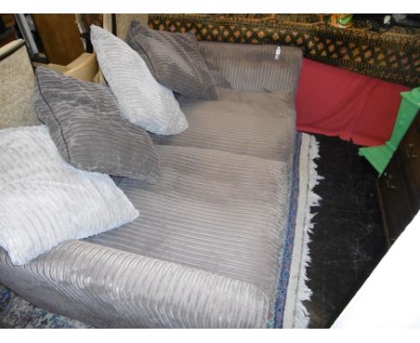 A BROWN CORDUROY SOFA