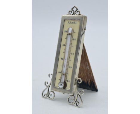 Silver easel-back thermometer with ornate supports, Birmingham 1922 'LE', 10cm tall.  