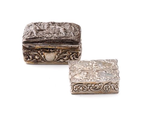 A pair of silver trinket boxes, both with embossed decoration, the larger being Birmingham 1900, the other 1969, 64.9 grams (