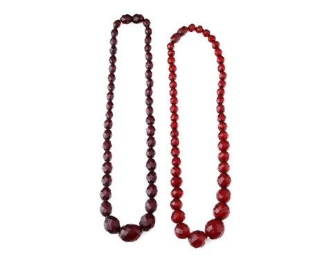 A pair of vintage bakelite cherry amber (or similar) graduated necklaces with faceted beads, each approx 41cm long, total wei