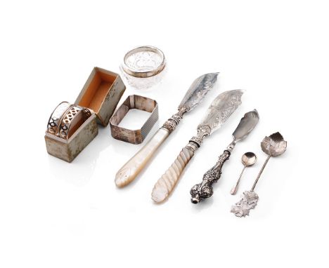A collection of silver items to include a pair of silver and Mother of Pearl handled fish knives, Birmingham 1871, a pair of 