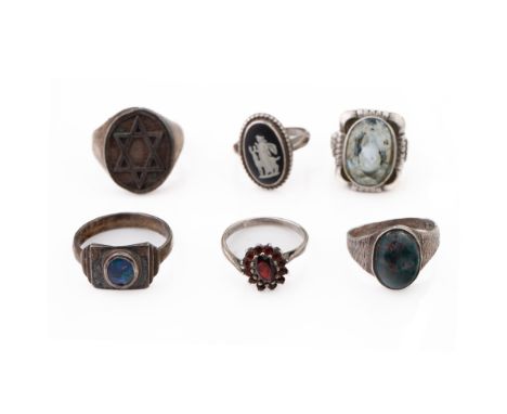 A collection of 6 silver rings to include an opal example, a Wedgwood Jasperware ring and others (6), 33.2 grams.  Condition 