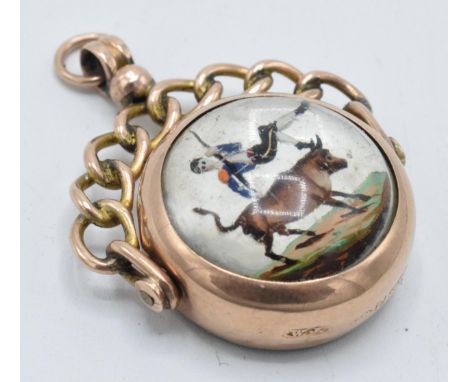 9ct rose gold pocket watch chain fob with ornate link handle with Essex Crystal insert of a bull fighting scene with compass 