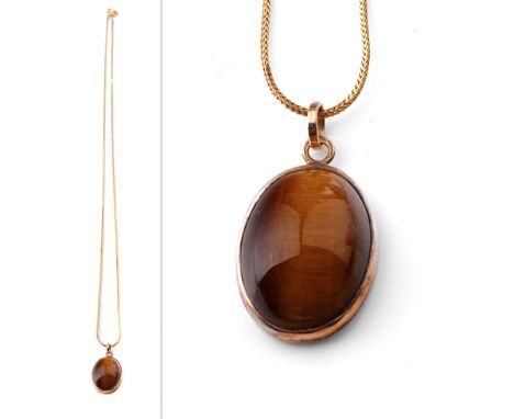 9ct gold chain with a 9ct gold tiger's eye pendant, 6.3 grams, chain 50cm long.  