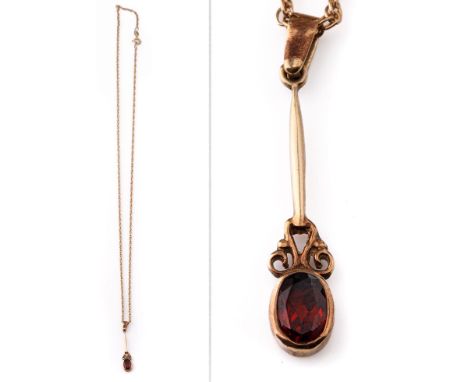 9ct gold chain with 9ct garnet pendant, 3.1 grams, chain 48cm long.  