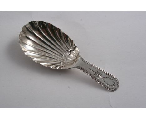 A LATE VICTORIAN IRISH CADDY SPOON with a fluted bowl and a bright-cut stem, by John Smith, Dublin 1896;  3.7"  (9.2 cms) lon