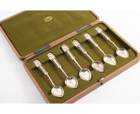 A LATE VICTORIAN CASED SET OF SIX ART NOUVEAU TEA SPOONS with pierced stems, by Liberty & Co., London 1899;  2.25 oz