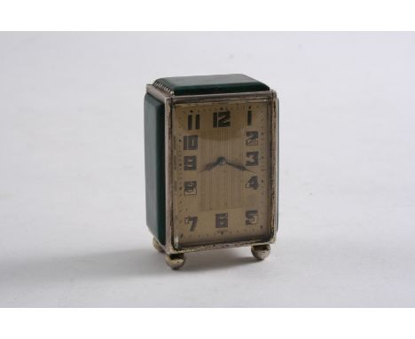 A SMALL GERMAN ART DECO BOUDOIR TIMEPIECE silvergilt with malachite panels & ball feet (with a jewelled Swiss movement);  2" 