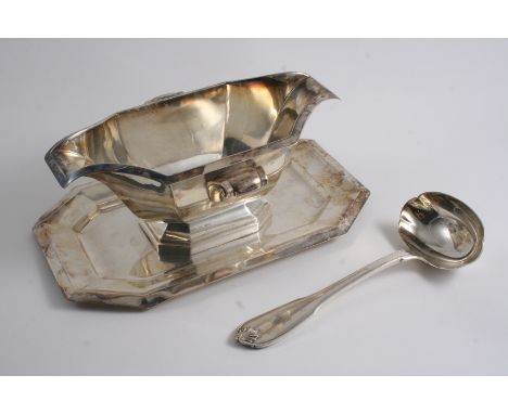 A FRENCH ART DECO DOUBLE-LIPPED SAUCE BOAT on an integral octagonal base, maker's mark "SF" (with an anchor), Paris 1925-30 a