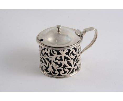 AN EARLY VICTORIAN PIERCED MUSTARD POT with a blue glass liner, domed cover & button finial, by Benoni Stephens, London 1840;