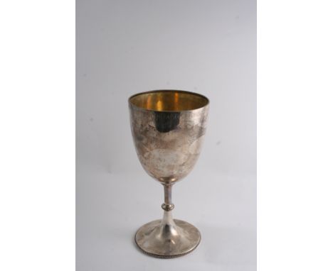 AN EDWARDIAN TROPHY GOBLET with bead borders and an engraved presentation inscription below the rim, by Messrs. Hutton & Sons