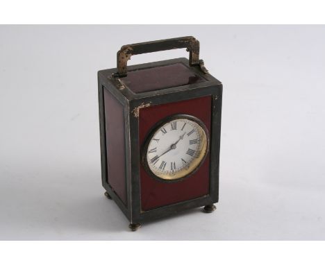 A LATE VICTORIAN OBLONG CARRIAGE TIMEPIECE with a swing handle & white enamelled dial with Roman numerals, the sides & top wi