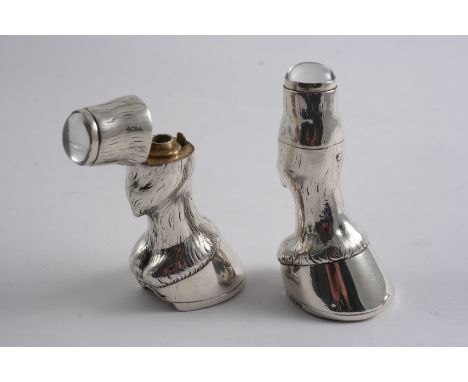 TWO VERY SIMILAR VICTORIAN NOVELTY SCENT BOTTLES each modelled as the lower leg & hoof of a horse, the hinged covers, each se