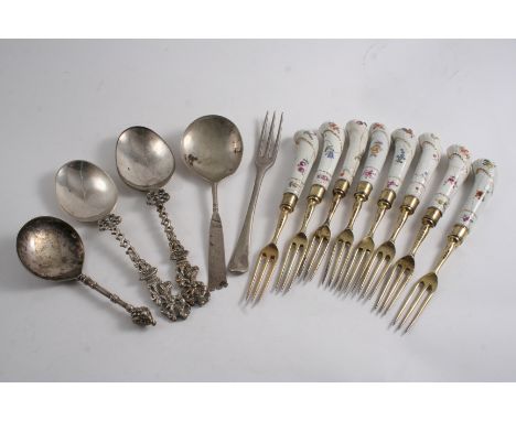 A MIXED LOT: A set of eight Victorian silvergilt dessert forks with porcelain pistol handles by George Adams, London 1861, an