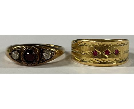 A late 19th century 18ct gold ruby and diamond three stone ring, size M, marked 18ct, 3.9g; an unmarked gold and ruby chip ri