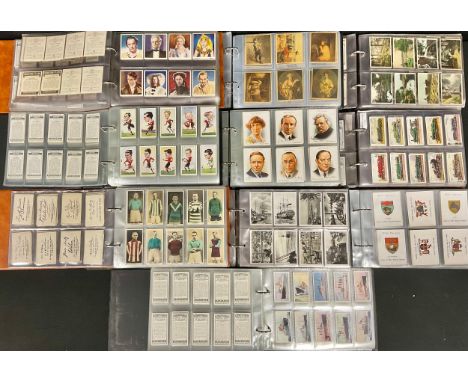 A large quantity of cigarette cards in full and part sets across ten albums, including Pattreiouex, Wills (small and large), 
