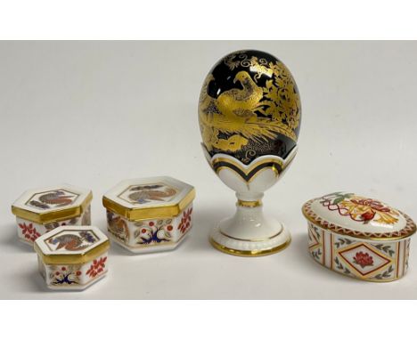 A Royal Crown Derby Black and Gold Aves pattern egg on stand, gold button, 13.5cm high, printed mark, first quality; a set of