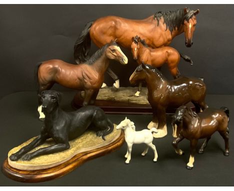 A large Leonards Collection model of a horse and foal; a Beswick model of a shire horse; other horse models; a ubrth light mo