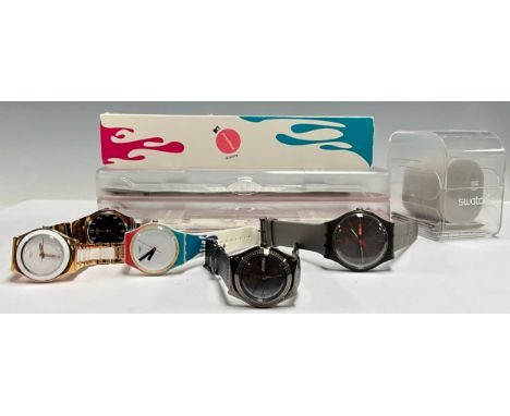 A Swatch MTV Playground watch, boxed; four other Swatch watches (5)