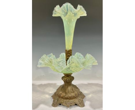 A 19th century shaped circular table centre, central uranium vaseline glass epergne flute, conforming dish, moulded spelter s