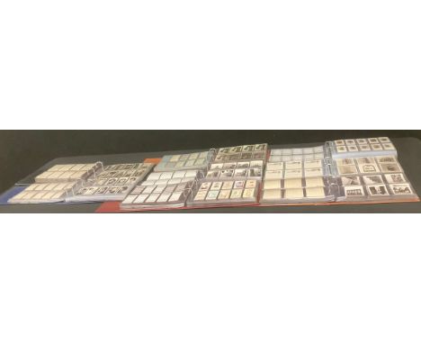 A large quantity of cigarette cards in full and part sets across eight albums, including Pattreiouex, Wills, Cavenders, R &am