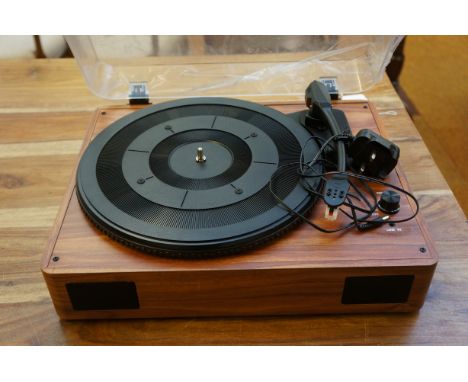 Portable turntable with integral speaker