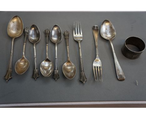 Collection of silver flatware to include a silver napkin ring Weight 248g