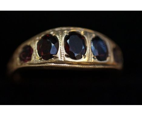 9ct Gold ring set with 5 garnets Size S