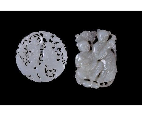 Two Chinese jade pendants, late Qing-Republican Period, one white jade circular pieced roundel with two figures amongst scrol