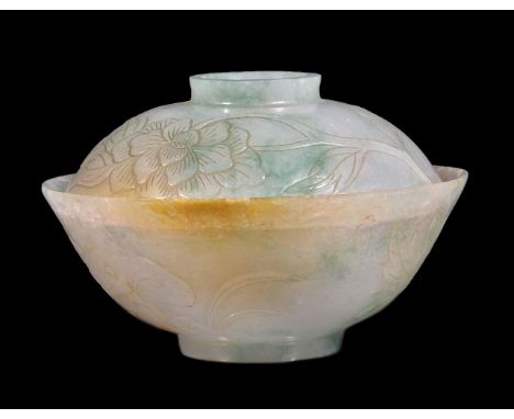 A Chinese white and green jade bowl and cover, late 19th century or Republican, carved and incised with flowering peony branc