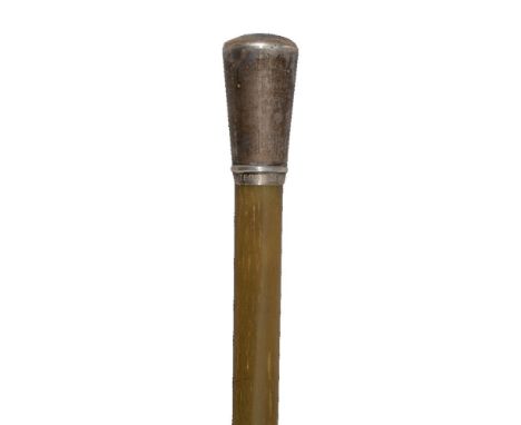 ϒA rhinoceros horn silver-mounted walking cane, 19th century, the long tapering stick entirely plain, with a silver-mounted p