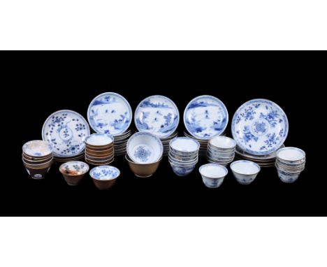 A group of Ca Mau 'Fisherman' shipwreck blue and white tea bowls of saucers, circa 1725, with a lone fisherman at the water's