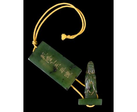 A Chinese gilt-decorated miniature spinach-green jade amulet, Qing Dynasty, Qianlong cyclical Yiwei mark corresponding to 177