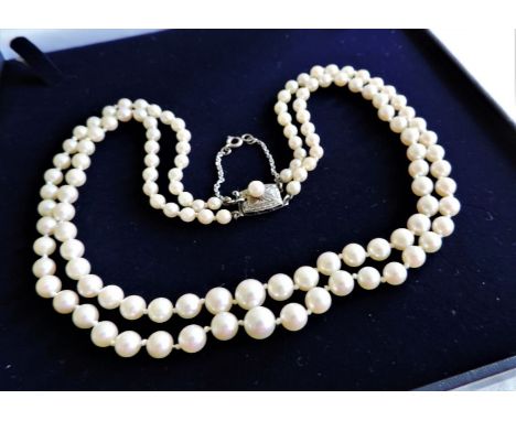 Vintage Cultured Pearl Necklace Silver Clasp.   A 17 inch double strand Cultured Pearl necklace circa 1950's. The necklace ha