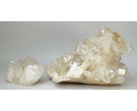 Natural history; a quartz crystal formation and another smaller, the first 45cm wide, (2). 