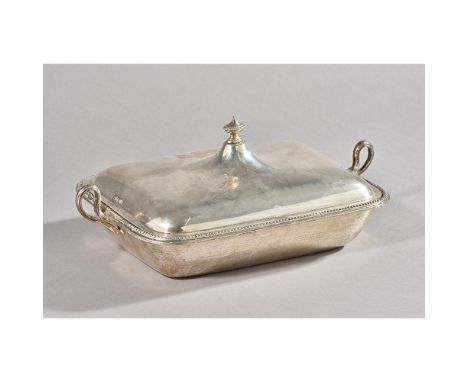 A Victorian silver twin handled entrée dish, liner and cover, Gibson And Langman, Sheffield, 1895, urn finial above tapering 