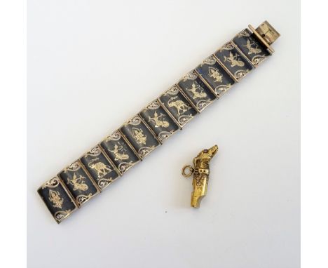 A Siamese niello decorated bracelet, in a curved panel shaped link design, on a snap clasp, detailed Sterling and a Victorian