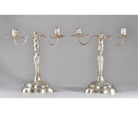 A pair of German twin light table candelabra, the candlesticks with mark of Johann (Hans) Jakob Baur V and the branches with 