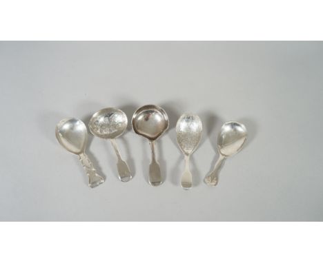 A Victorian silver fiddle pattern caddy spoon, the oval bowl with floral engraved decoration, London 1842, a Victorian silver