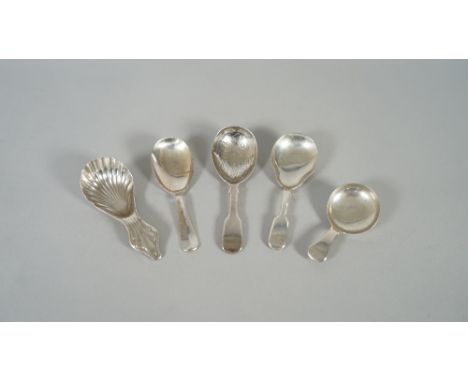 A George III silver caddy spoon, having a scalloped bowl and a trefoil motif to the handle, Sheffield 1802, a Victorian silve